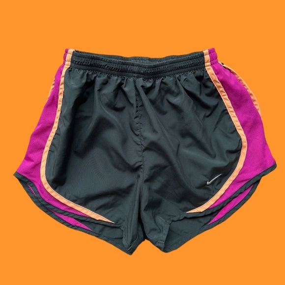 Nike DriFit running shorts in black with purple and orange trim - Picture 1 of 9